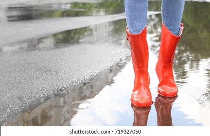 Woman In Red Rubber Boots, Outdoors