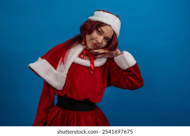 A woman in a red Santa outfit is posing for a picture - Powered by Shutterstock