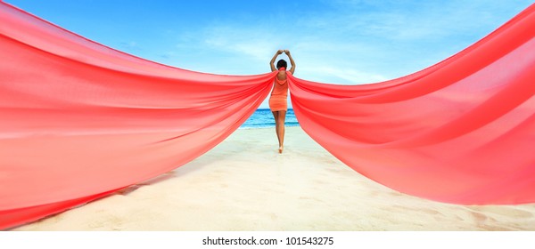 Woman With Red Scarf On The Beach