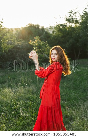 Similar – Junge Frau genießt Sonnenlicht im Herbst