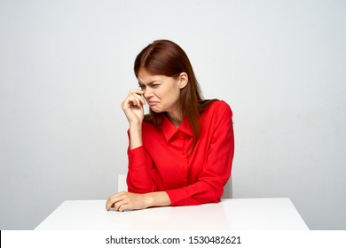 woman in red shirt turned away sideways isolated background and jobs                     