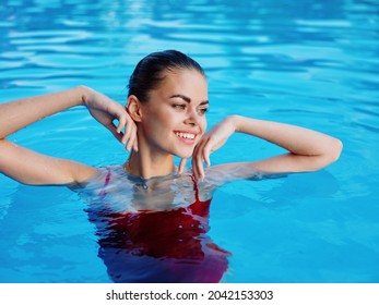 Woman In Red Swimsuit In Pool Nature Close Up Luxury