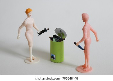 Woman Rejects Man By Tossing Him In The Trash. Online Dating Concept Or Bad Boss Situation. Rejection Or Refusal Between The Genders. Get Rid Of Bad Relationships And Dysfunction In The New Year. 