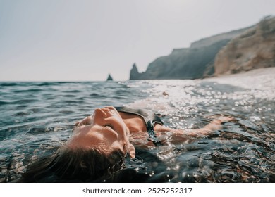 Woman Relaxing in the Clear Sea - Powered by Shutterstock