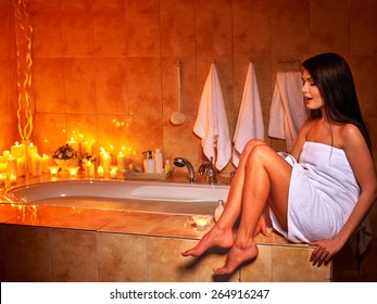 Woman Relaxing At Home Luxury Bath. Burning Candle.