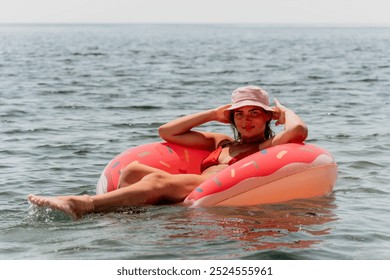 Woman Relaxing Inflatable Float Ocean Beach - Powered by Shutterstock