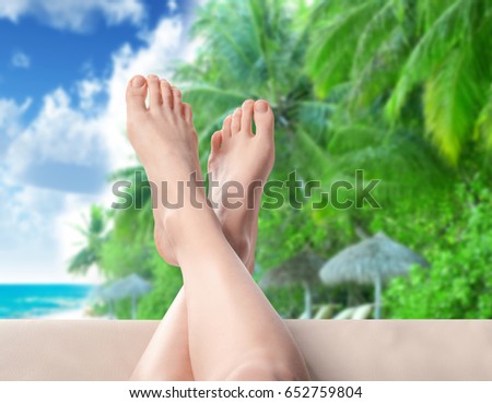 Woman relaxing on beach, closeup. Summer vacation concept