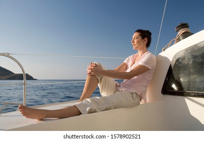 A Woman Relaxing On A Boat