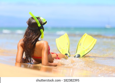 Woman Relaxing On Summer Beach Vacation Holidays Lying In Sand With Snorkeling Mask And Fins Smiling Happy Enjoying The Sun On Sunny Summer Day On Maui, Hawaii, USA.