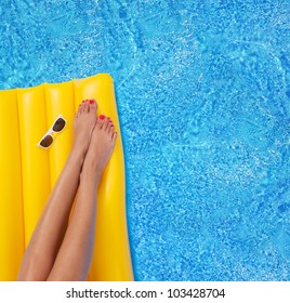 Woman Relaxing In A Pool - Feet Close Up