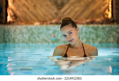 Woman Relaxing In A Whirlpool Bath Tube