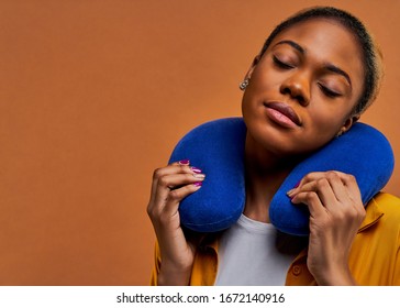 Woman In Rest With Blue Neck Pillow. Travel Concept