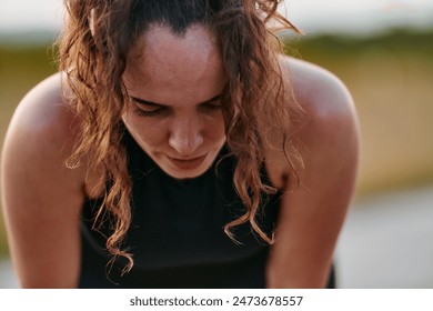 Woman Resting After Intense Run - Powered by Shutterstock