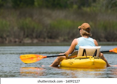 Woman Resting On Kayak