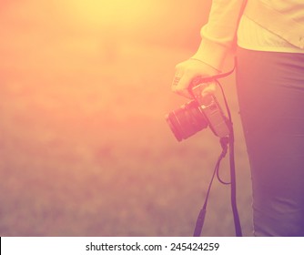 Woman With Retro Camera