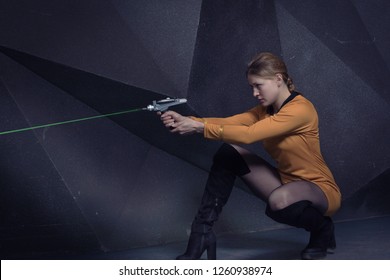 Woman In Retro Style Sci-Fi Movie Shoots Out Laser Weapons