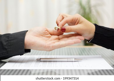 woman returned wedding ring to  husband . Divorce concept