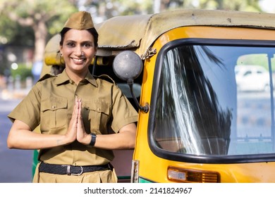 Woman Rickshaw Driver Greeting With Prayer Pose
