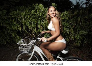 Woman Riding A Beach Cruiser