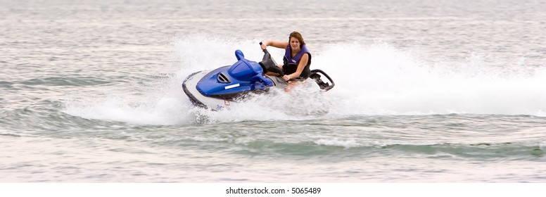 Woman Riding On Seadoo Jetski