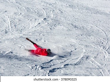 Woman Riding On Skis Fall Down