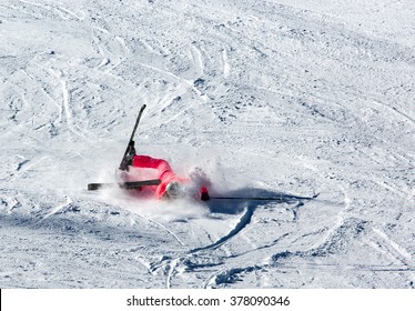 Woman Riding On Skis Fall Down