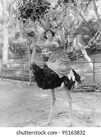 Woman Riding Ostrich