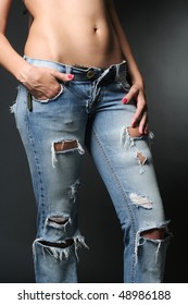 Woman In Ripped Jeans