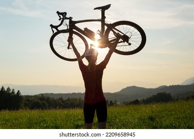 Woman Road Cycling On Race Bike Outdoor In Nature