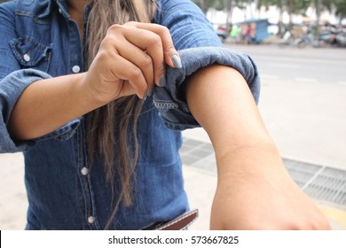 Woman Roll Up The Sleeves