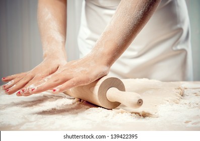 Woman Rolling Dough, Close-up Photo