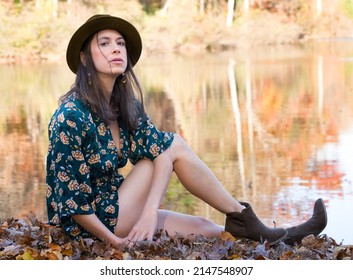 Woman In Romper And Ankle Boots Outdoors