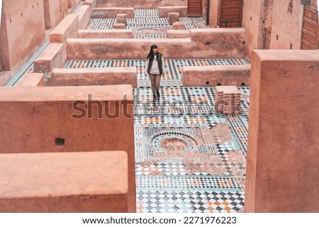 Woman at the Ruins of the El Badi Palace in Marrakech Morocco