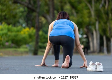 Woman runner is running barefoot without shoes to avoid bunion, achilles and other foot injuries as a result of narrow toe box from conventional sport shoes to build a better muscle strength