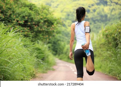 Woman Runner Warm Up Outdoor