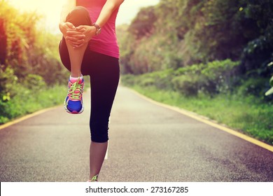 woman runner warm up outdoor