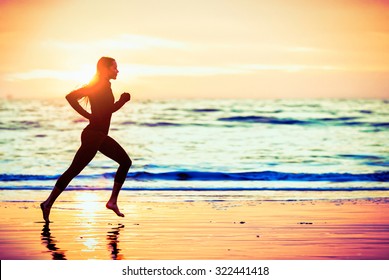 Woman running on the beach at sunset - male version in portfolio