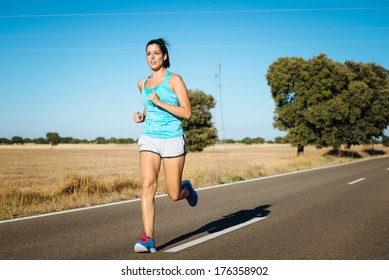 Woman Running On Road. Female Sweaty Athlete Exercising.