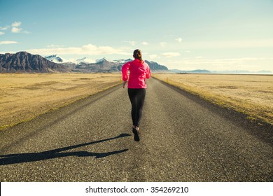 Woman Running On A Winter Day