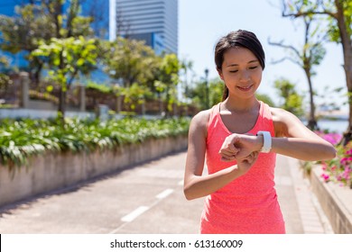 Woman Running With Smart Watch