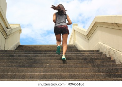 Woman running up the stairs, Fitness woman legs running and burn fat in the body, Healthy lifestyle concept