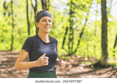 A Woman running and training and exercising for marathon endurance. Fitness healthy lifestyle concept. - Powered by Shutterstock