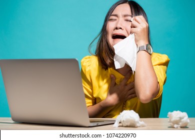 Woman so sad when she look at laptop