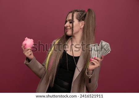 Woman saving money in a piggybank