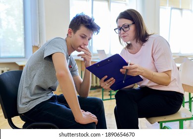 Woman School Psychologist Talking And Helping Student, Male Teenager. Mental Health Of Adolescents, Psychology, Social Issues, Professional Help Of Counselor