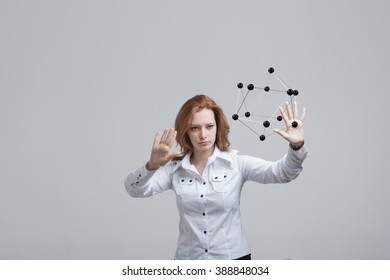 Woman scientist holding model of molecule or crystal lattice. - Shutterstock ID 388848034