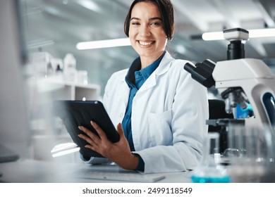 Woman, scientist and portrait with tablet in lab for microscope research, medical data and science information. Smile, researcher and digital for study feedback, vaccine solution and biotechnology - Powered by Shutterstock