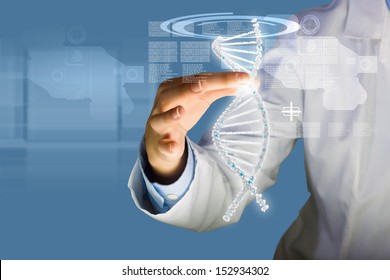 Woman scientist touching DNA molecule image at media screen - Powered by Shutterstock