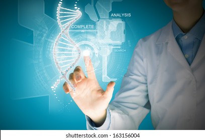 Woman scientist touching DNA molecule image at media screen
