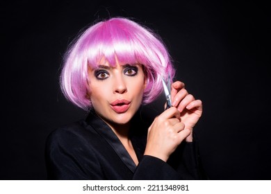 Woman With Scissors Having Hair Cut. Beautiful Girl With Straight Hair With Professional Scissor On Black. Haircare Concept.